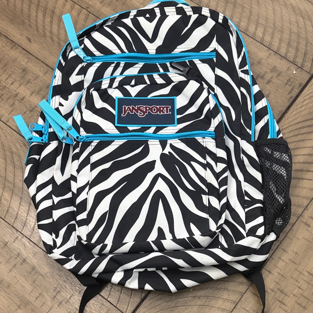 JanSport Zebra Print Backpack with Turquoise Accents